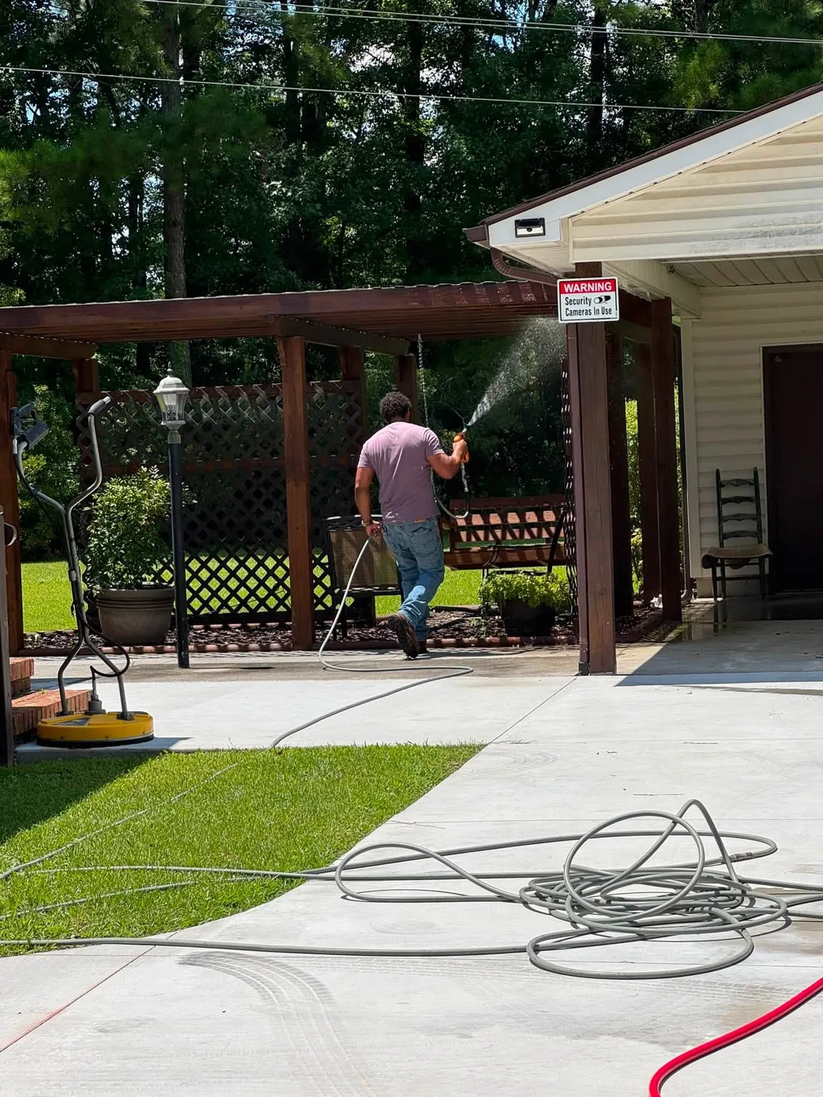 Washing a backyard pergola and patio in coastal North Carolina