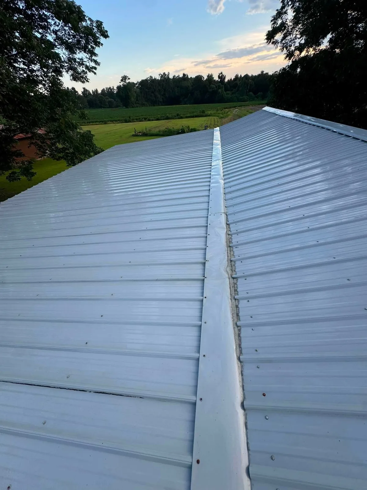 Same metal roof clean and bright after soft washing